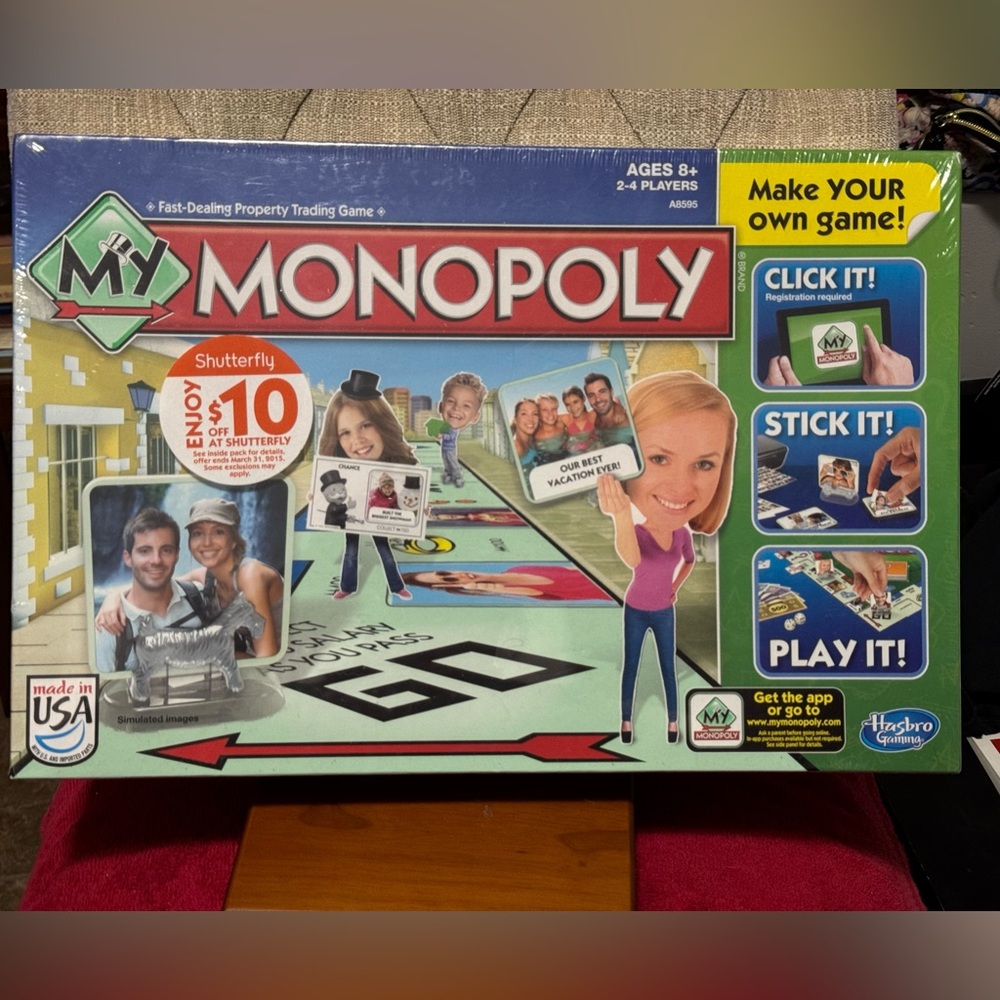 Monopoly  Hasbro Customizable Board Game with Red and White Accents. New inbox.